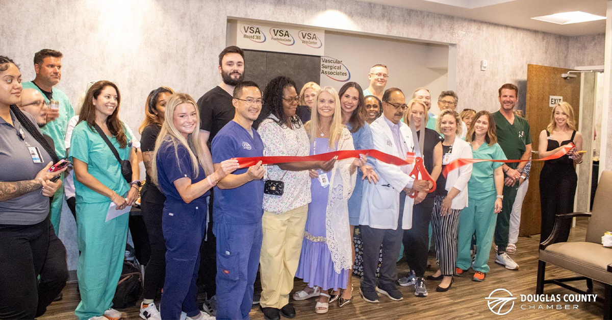 Cutting the ribbon for the new Douglasville office.